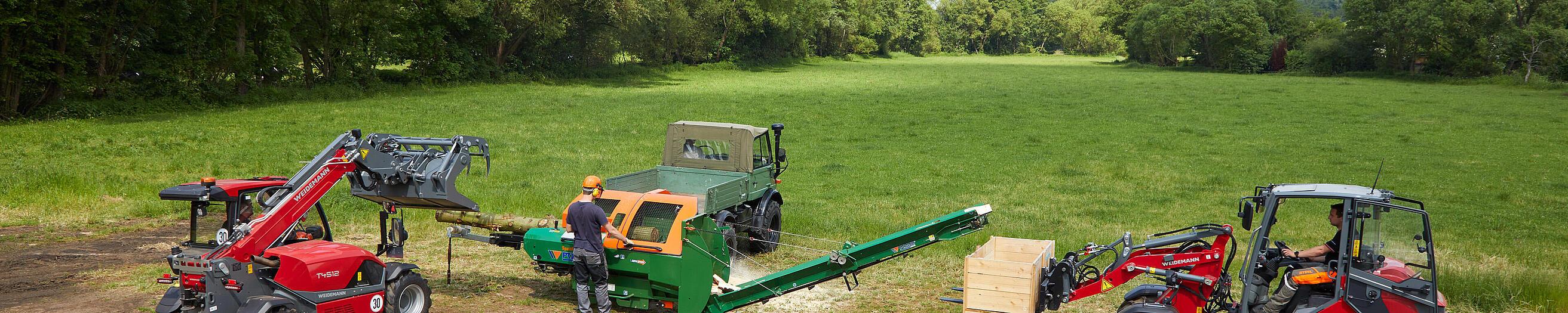 Hoftrac 1390 y cargadora telescópica T4512 de Weidemann en acción