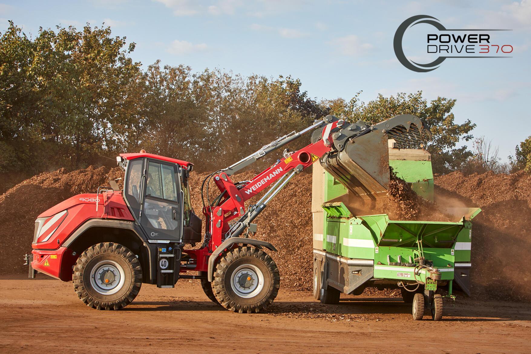 Weidemann wheel loader 9080 in use with lightweight bucket in an earthworks supply - above left logo of PowerDrive 370
