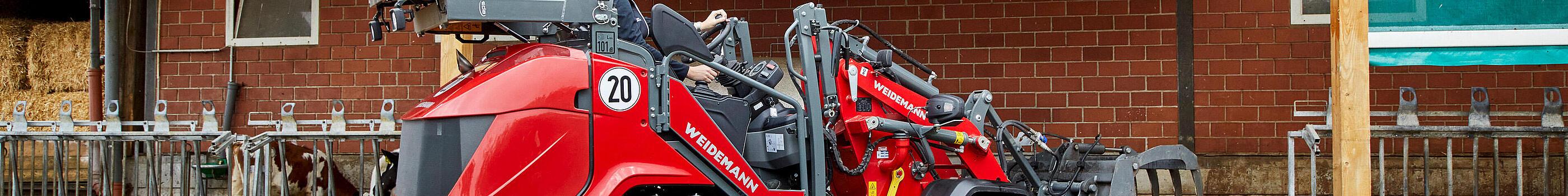Weidemann Hoftrac 1390 with folded-down overhead guard (eps)